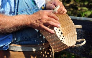 Man weaving a basket